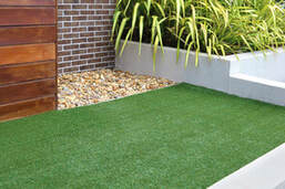 artificial grass installed at a frontyard in hpuston